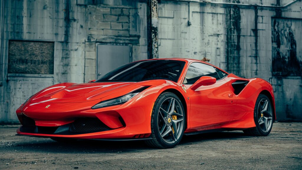 Red Ferrari F8 Tributo showcasing a flawless paint protection film (PPF) application in Hyderabad.